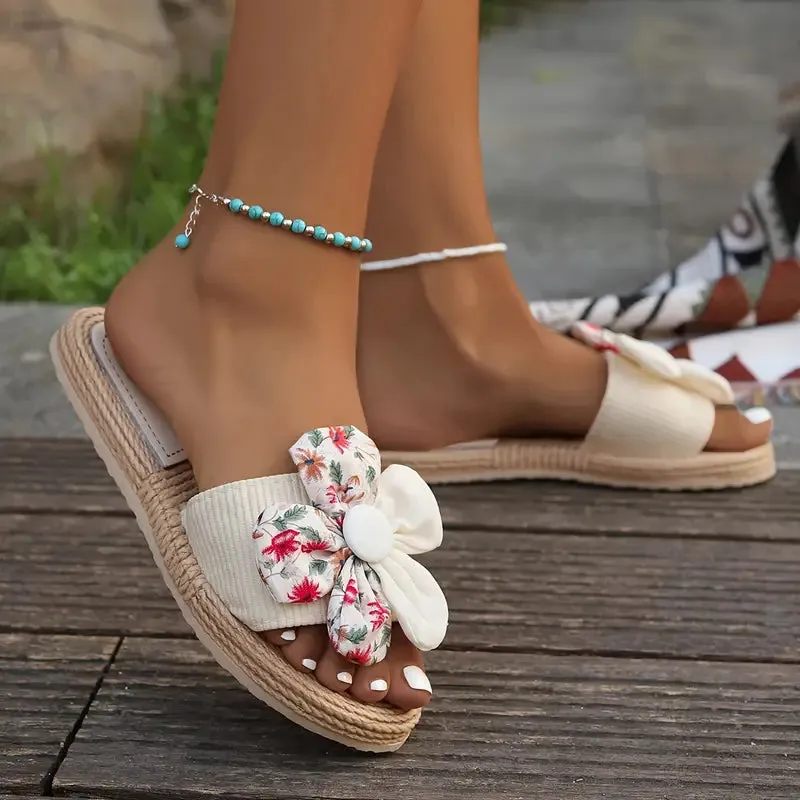 Treice – Espadrilles met een bloemenstrik